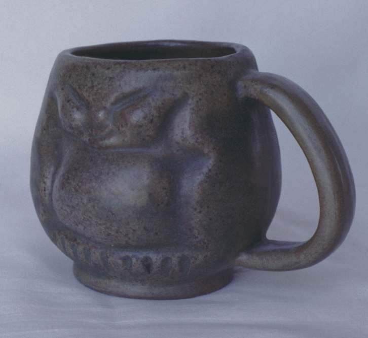 Pottery mug, three and an eighth inches high. Made by Tundra Pottery