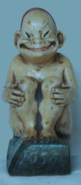 Joss figurine of alabaster. Total height, five and a half inches. 1908.